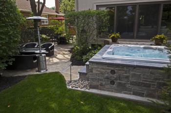 Hot Tub in custom stone cabinet