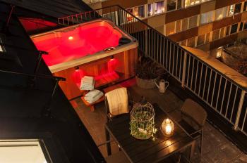 Hot Tub on balcony at night