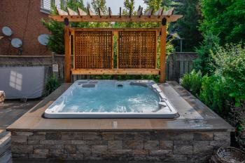 Hot Tub immerged in a stone frame